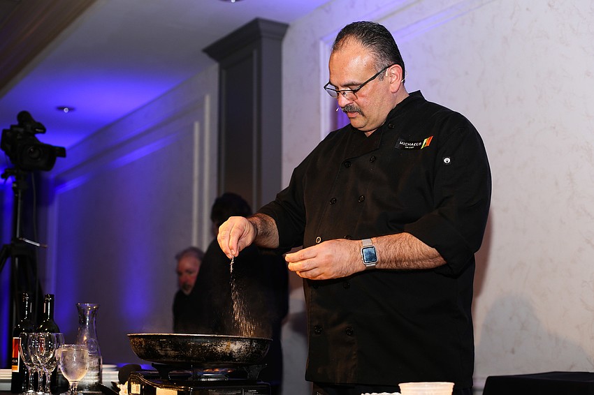 Chef Jamil shows guests how to cook the dish.