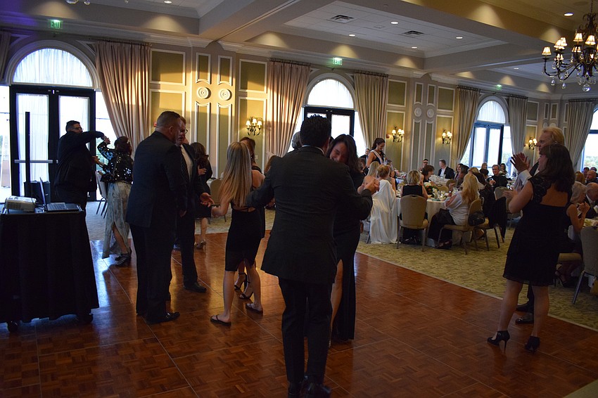 Plenty of couples took to the dance floor after dinner.