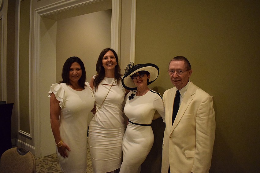 Lori Bollinger, Pam Ali, and Deborah and Charlie O'Mara of Michael Saunders & Company.