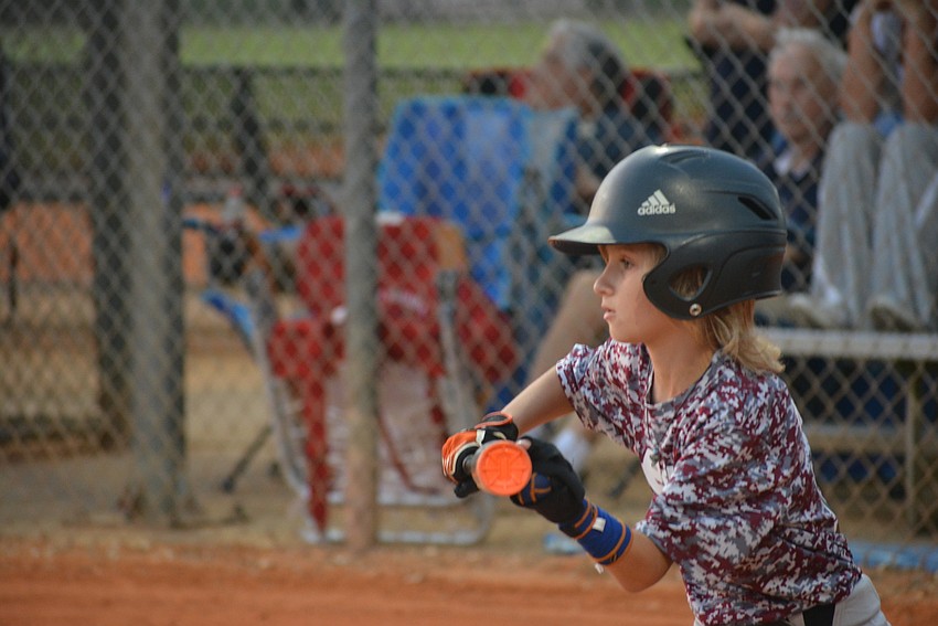 Landon Marazon attempts a bunt in his Minors game.