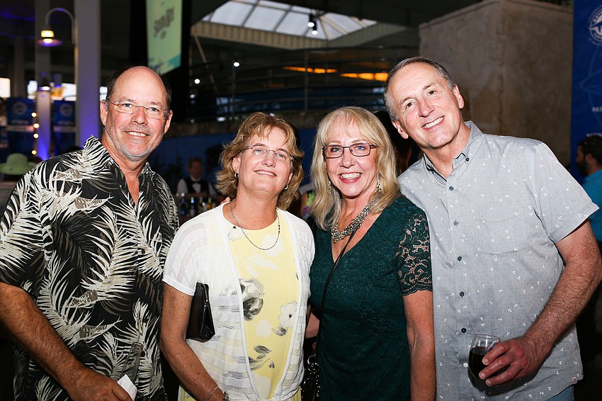 John Stewart, Cathy Walsh, Dena Smith and Reed Schwartz