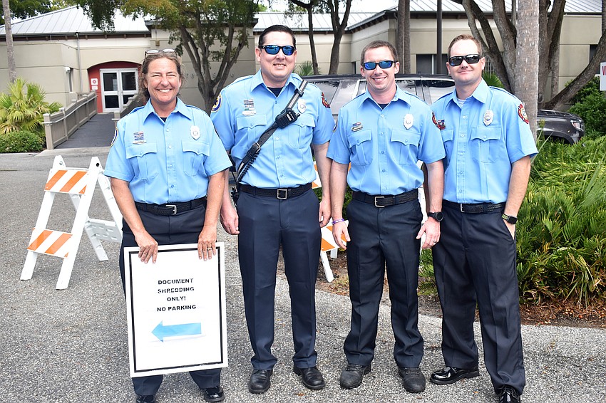 Firefighters Dawn Dunkum, Jason Berzowski, Chase Opela and Ron Franklin