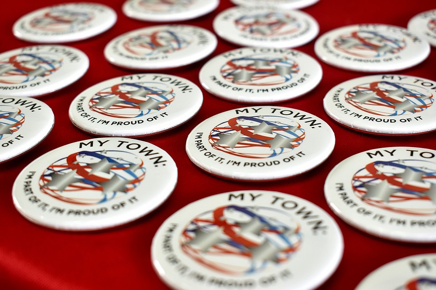 Residents could take pins home.