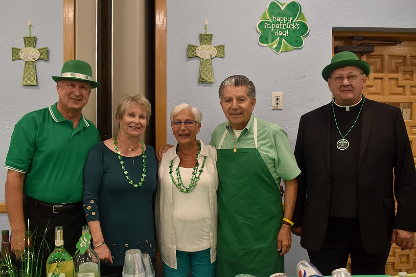 Chuck and Gayle Sobieck, Theresa and Lenny DiStefano and the Rev. Phil Schweda