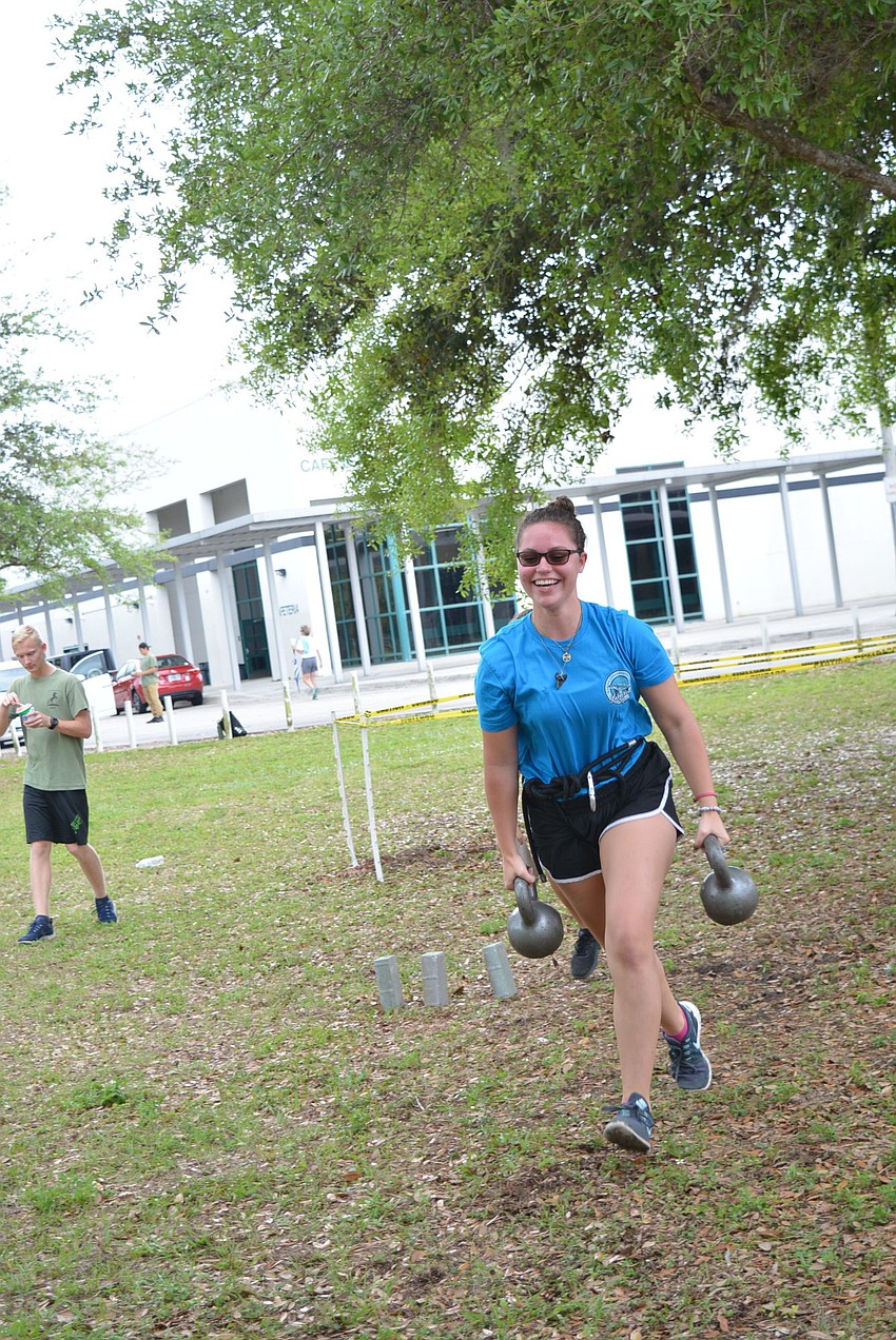 Izzie Uribe tries the JROTC obstacle course and is shocked by how heavy the kettle bells are. She tries the challenge because her sister, Sofia Uribe, and boyfriend, Ethan Nicholls, are in JROTC.