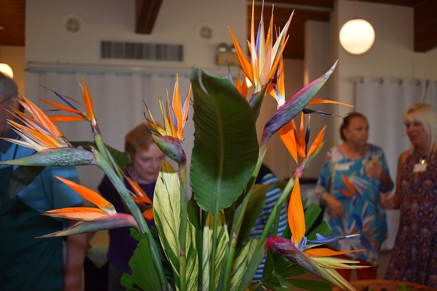 The centerpiece was a colorful orange and green plant.