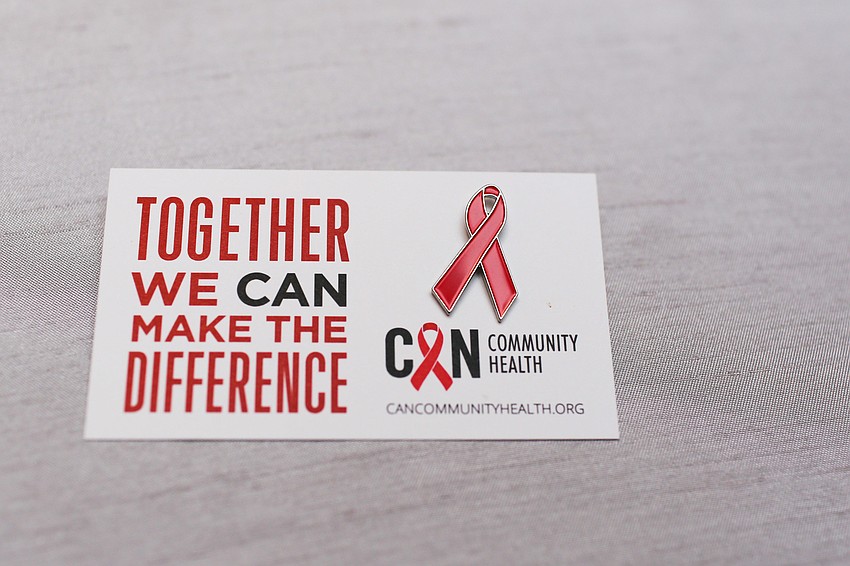 Guests put on bracelets in support of the organization.