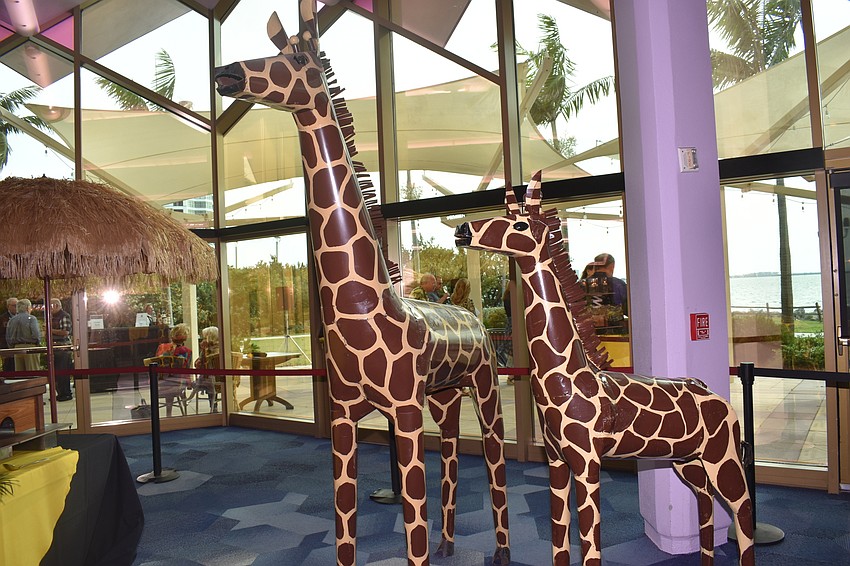 Giraffe sculptures were on display in the dining area.