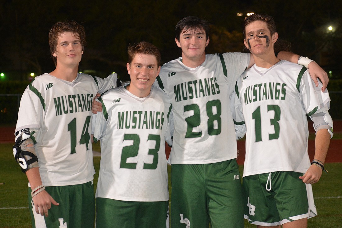 Lakewood Ranch High boys lacrosse captains Colby Anderson, Peyton Mullin, Jacob Wolf and Owen Ingham.