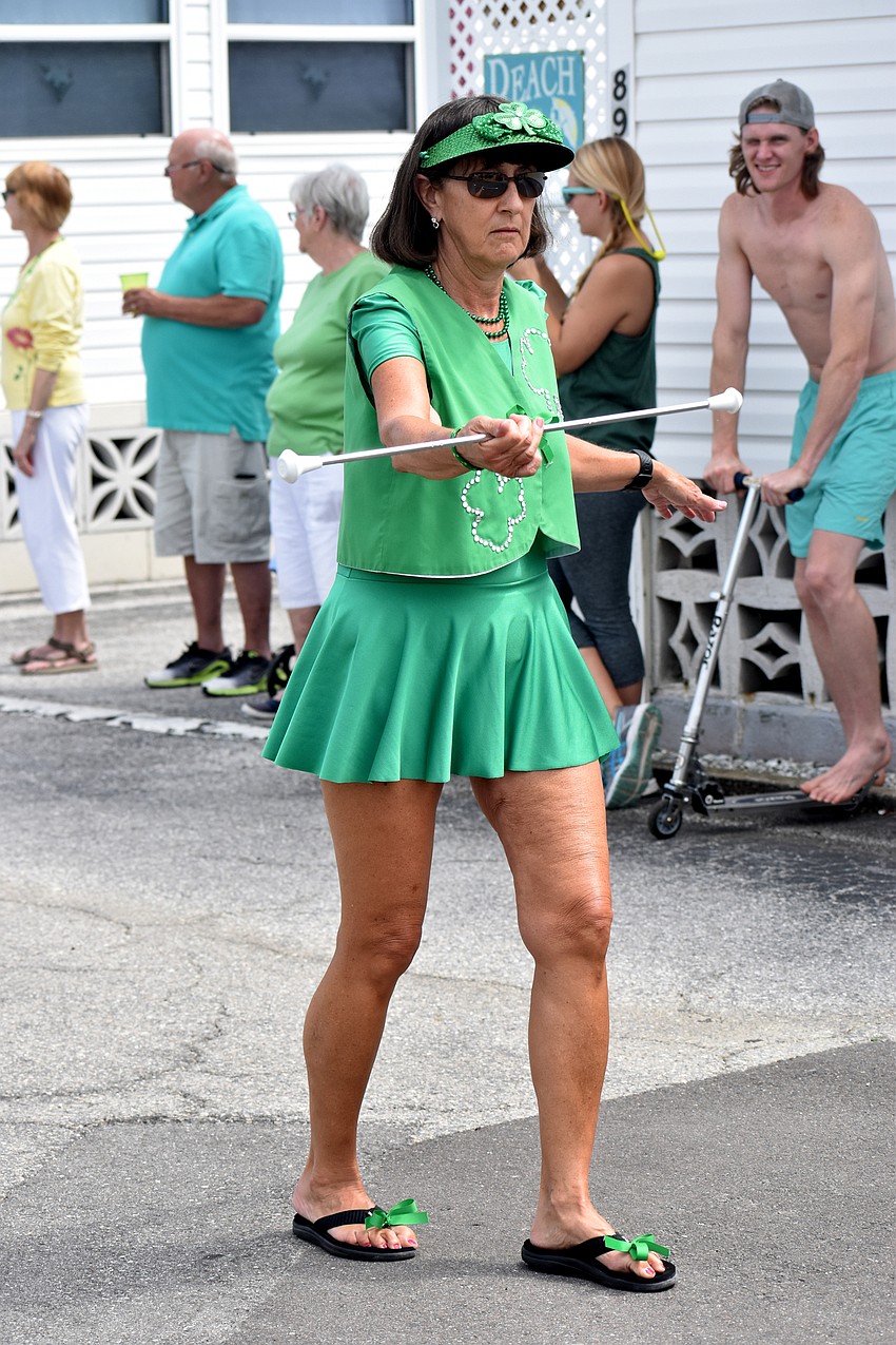 Elaine Lentz leads the McNamara Band with baton twirling.