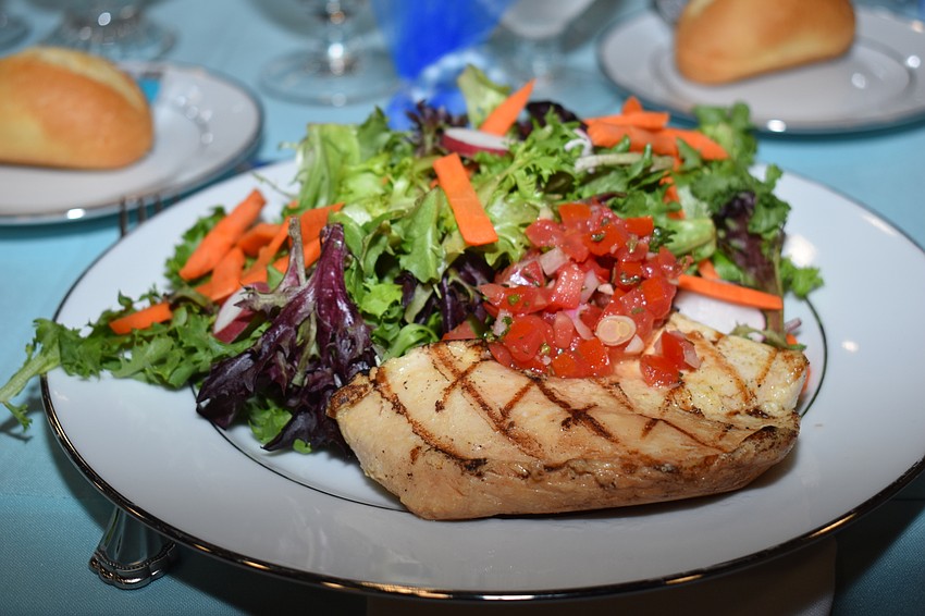 The food included grilled chicken and salad.