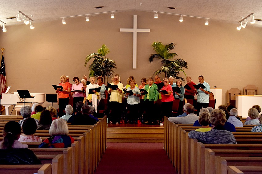 The Village Voices performed songs such as “Take Me Out to the Ball Game” and “Singin’ in the Rain.”