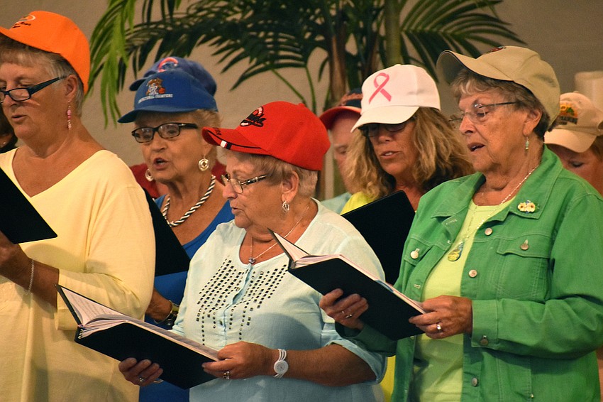 For ““Take Me Out to the Ball Game,” the singers wore baseball hats.