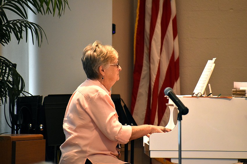 Bonnie Wolfgram, who is the chapel music director, is also the director of The Village Voices.