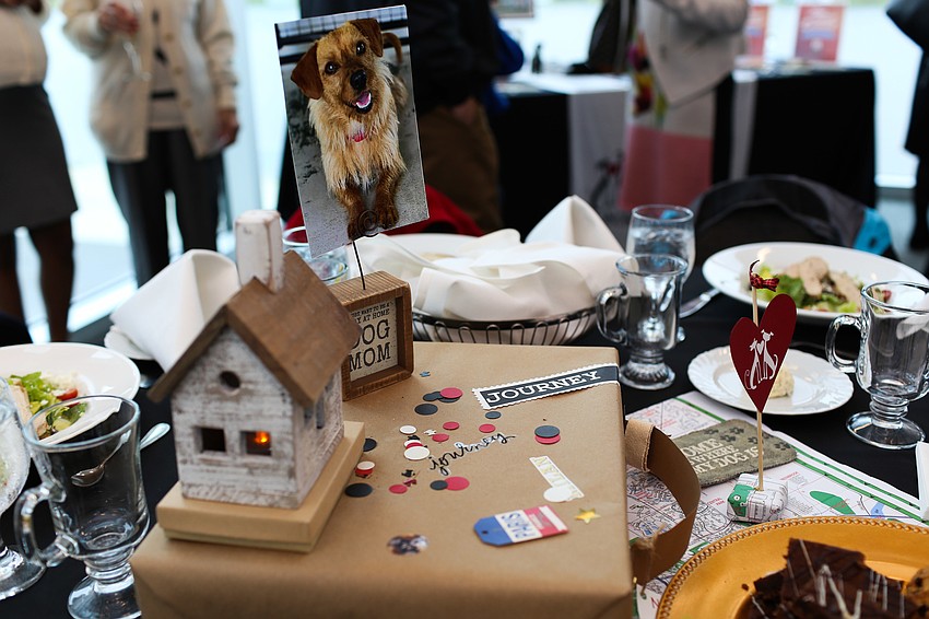The centerpieces featured a different pet on each table.