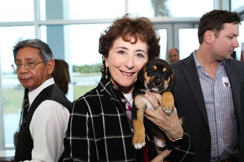 Barbara Brizdle with a puppy