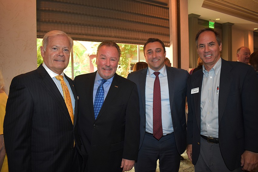 Charlie Murphy, Michael Klauber, Commissioner Hagen Brody and Jay Berman