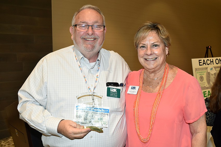 Norm Mallard Ambassador of the Year award winner Jack Dean and Chamber of Commerce President Gail Loefgren