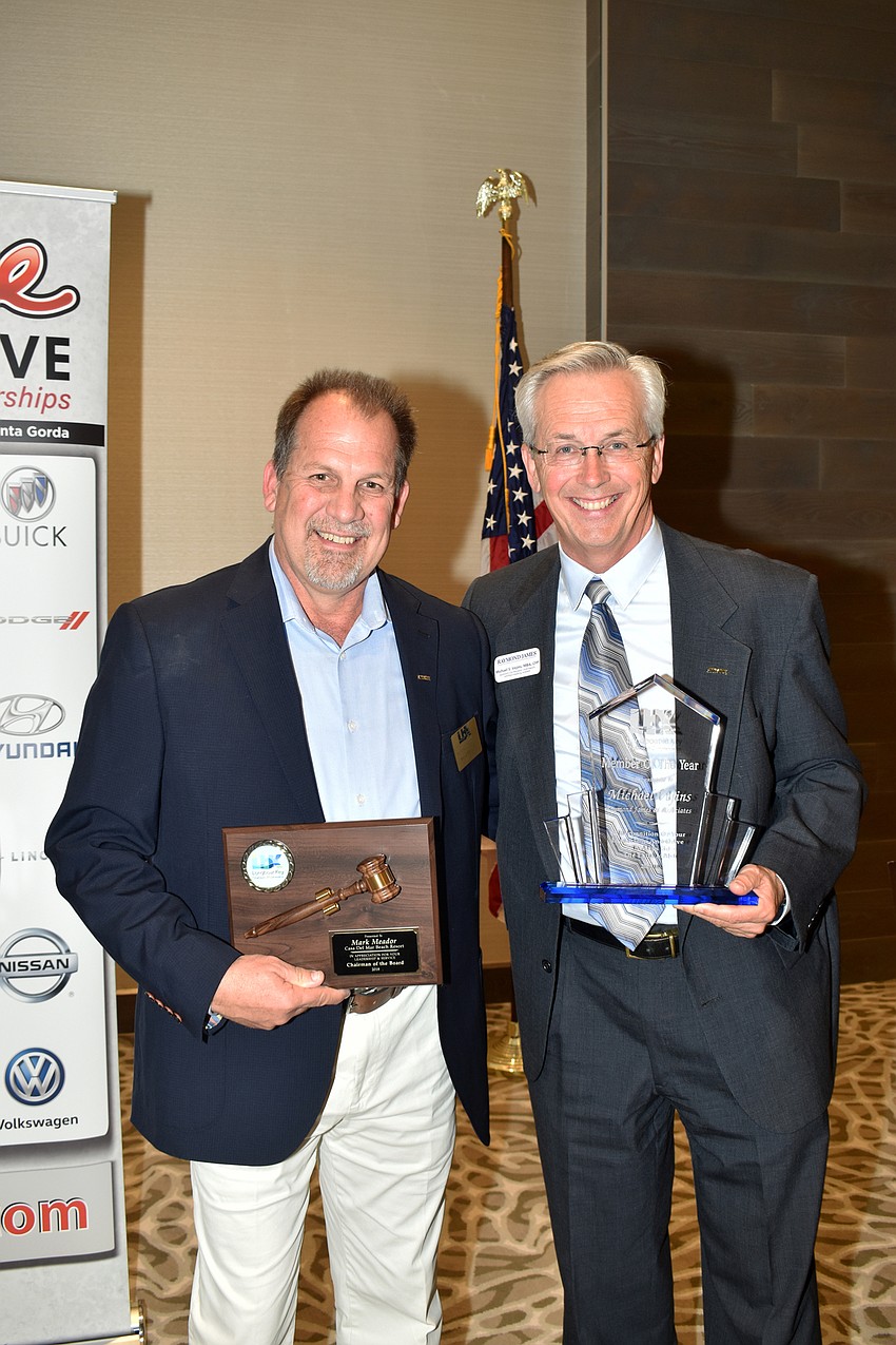 Outgoing Chamber Chairman Mark Meador with Chamber Member of the Year Michael Vejins