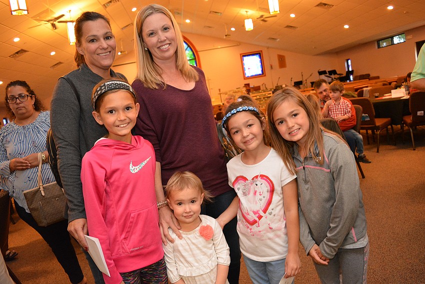 Clockwise from front left: Julia Mulligan, Jenny Mulligan, Vanessa Heuss, Kiley Mulligan, Kayte Mulligan and Jolene Heuss all live in the Mill Creek community.