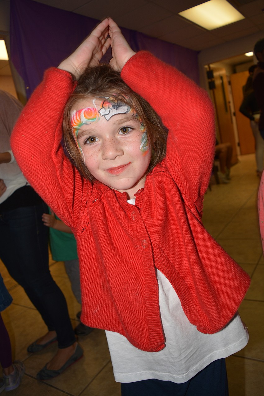 Five-year-old Charlotte Cifuni has fun pretending to be a 