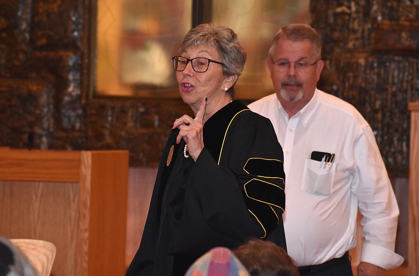 Sandra Packard dressed as a judge for the celebration.