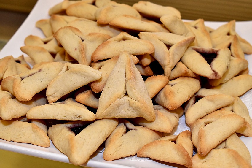 Following the reading and skit, attendees enjoyed refreshments including hamantaschen.