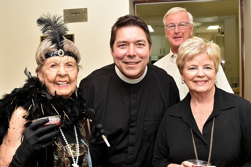 Marjorie Stapleton, the Rev. David Marshall and Richard and Jamie Engle
