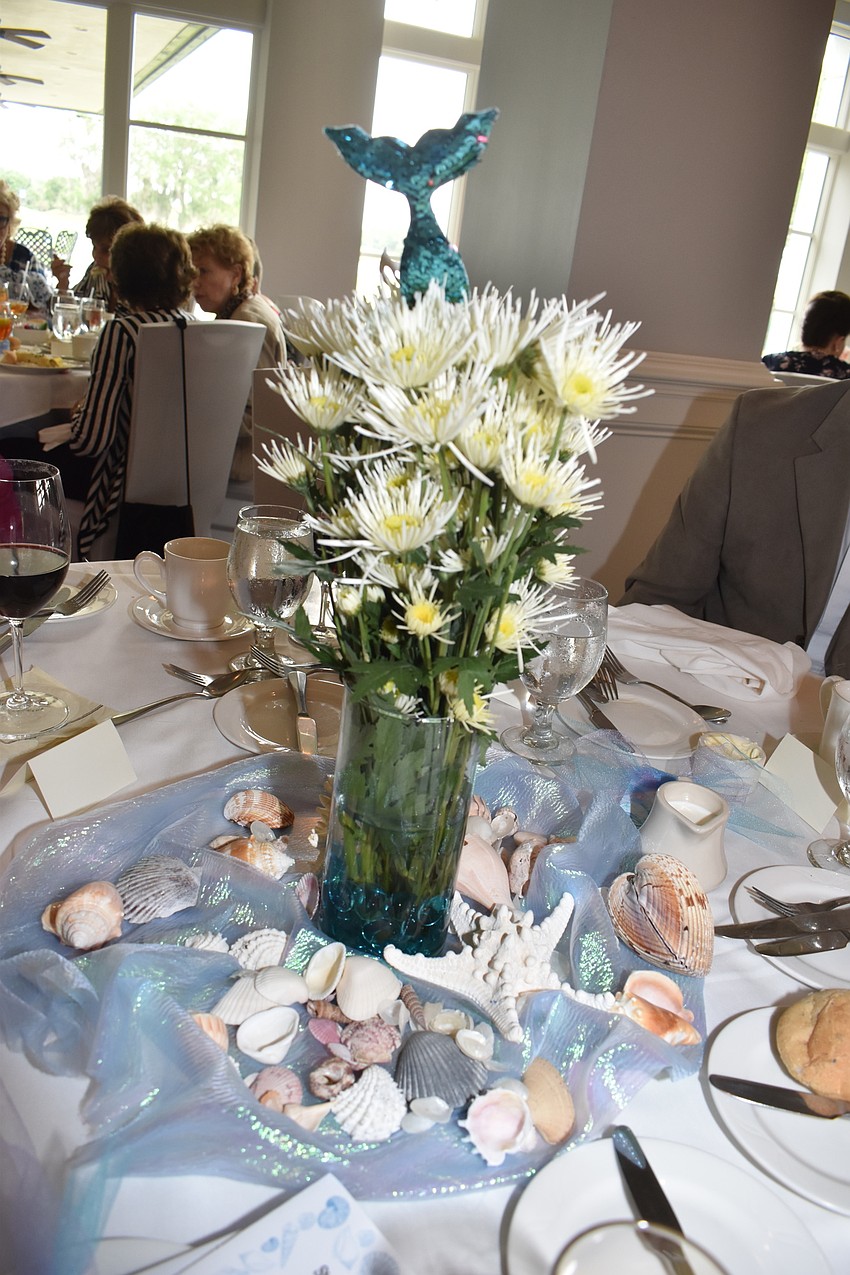The centerpieces embraced the theme of fanta-sea.