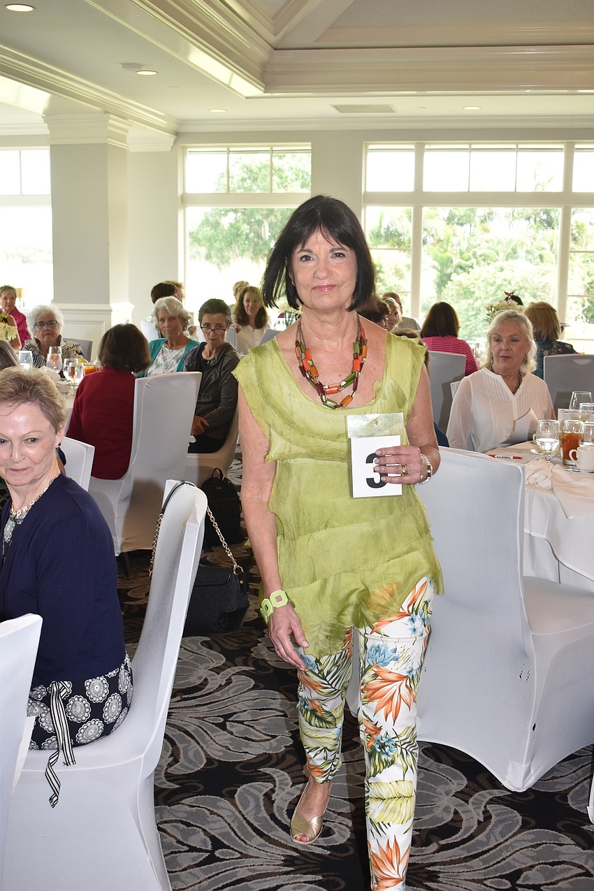 Marie Tabor models for the crowd.