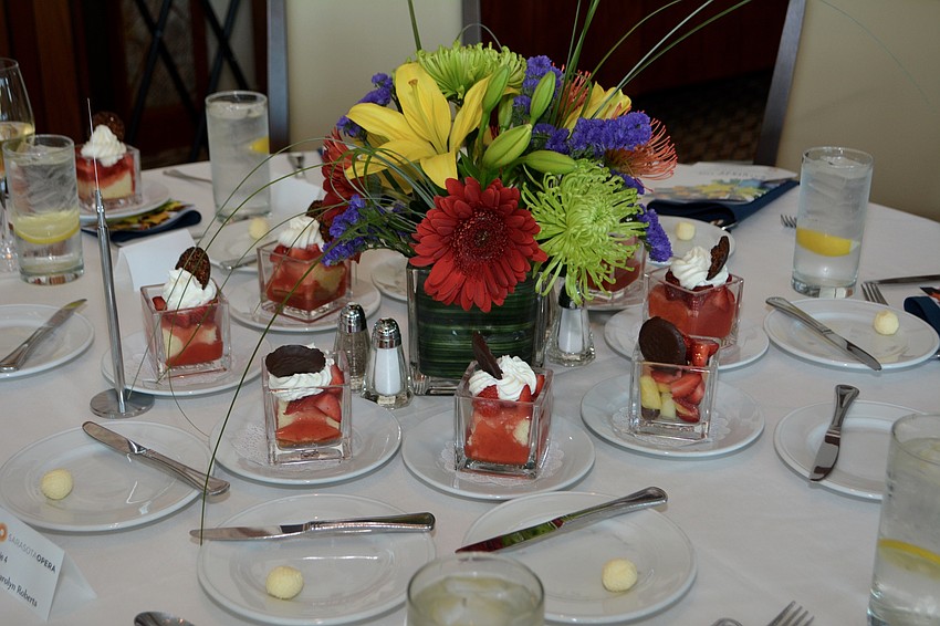 Floral centerpieces brightened every table.