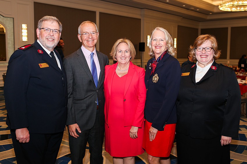 Major Chad Whiten, Honorees Brock and Julie Leach, Chairwoman Kim Cornetet and Major Julie Whiten