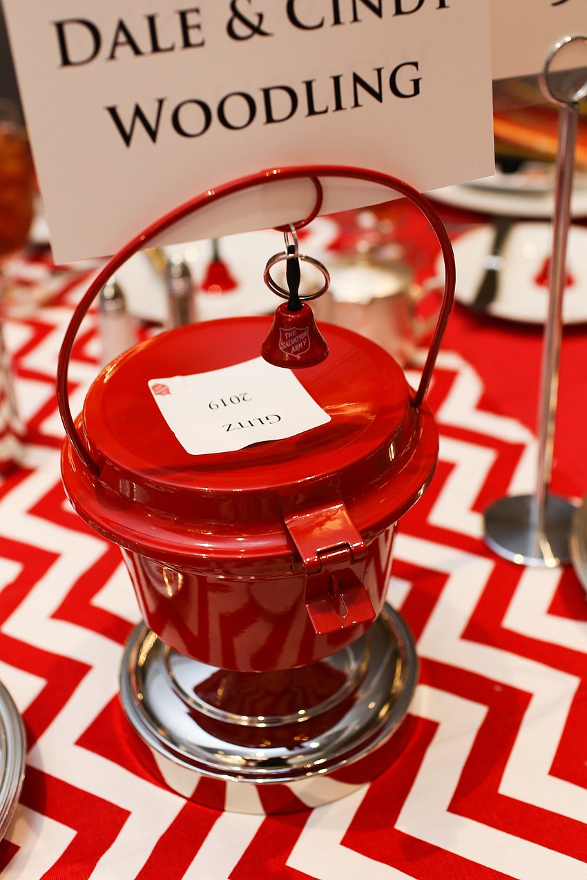 Guests dropped their donation cards into the bucket on each table.