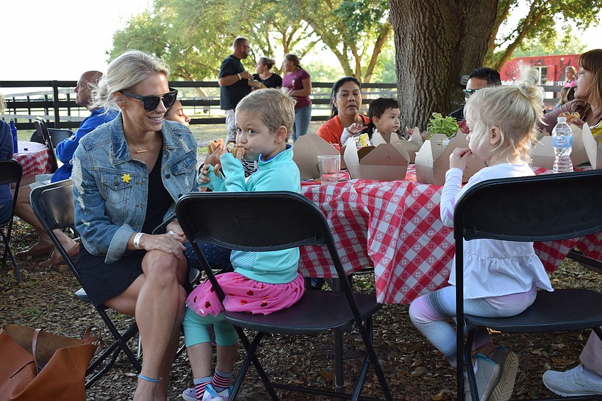 Rachel Wells and her daughters, Charlotte and Savannah.