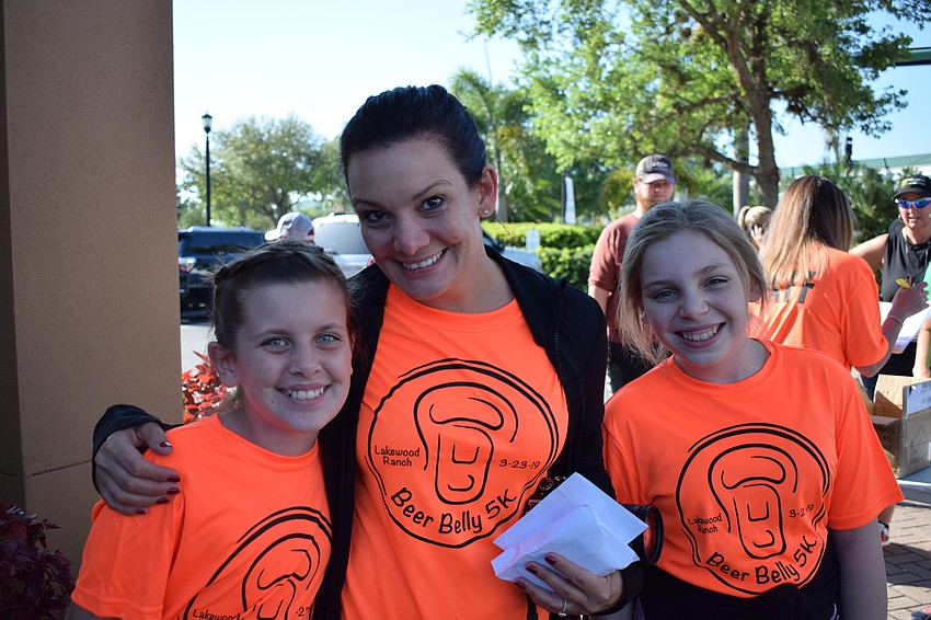 Organizer Leslie McHugh and her daughters Lily and Madison enjoyed each other's company at the race.
