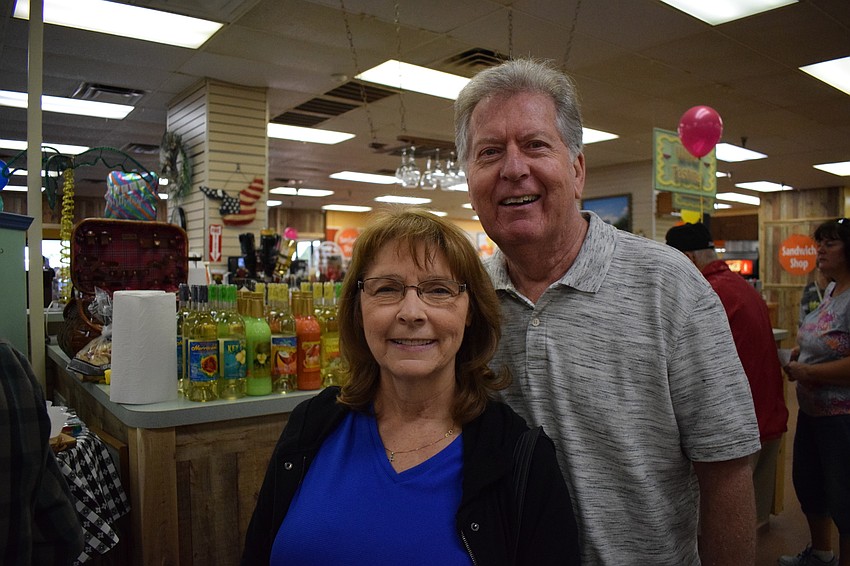 Peggy and Fred Gritzenbach of Bayshore enjoyed the wine samples offered at Taste of Mixon's.