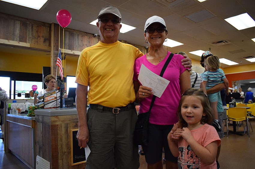 Merv and Nancy Maynard, of Michigan, brought their granddaughter Lizzie to the Taste of Mixon's event.