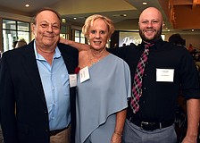 Event hosts Chuck, Sue and Tom DiNatale