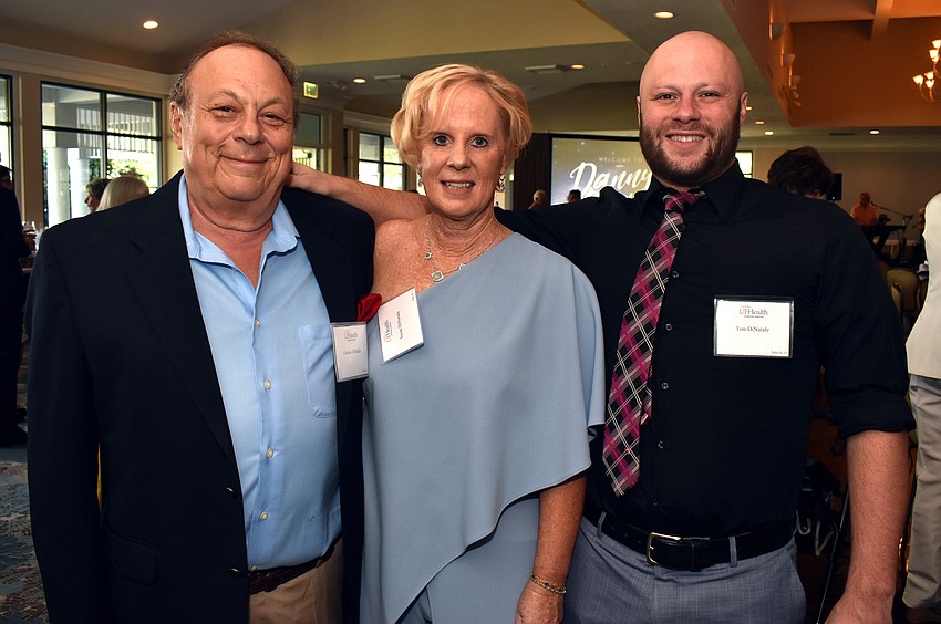 Event hosts Chuck, Sue and Tom DiNatale
