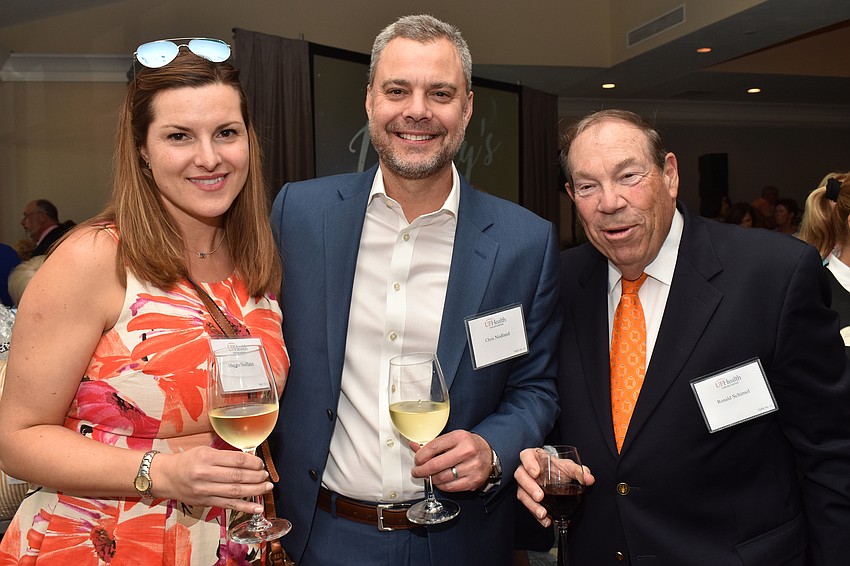 Maggie and Chris Nodland and Ron Schimel