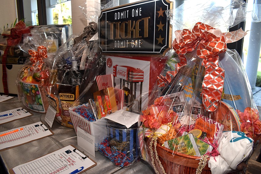 The silent auction included a “movie night” basket.