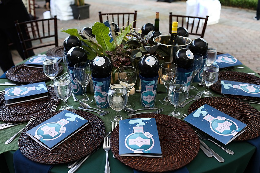 Tables were set up under a tent outside.