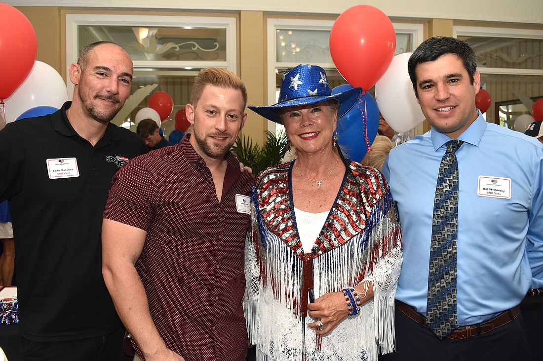 Eddie Cacciola of SRQ Vets, Bryan Jacobs of Vets 2 Success, President of Operation Kindness, Florida Inc, Joanne Forch and Bill Sterbinsky of SRQ Vets at last year&#39;s dinner.