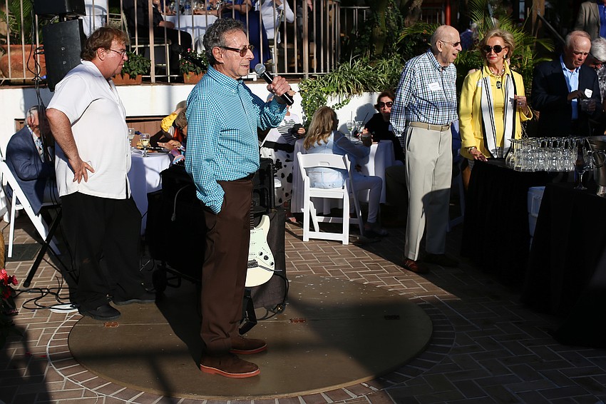 Ron Greenbaum welcomes guests to his home.