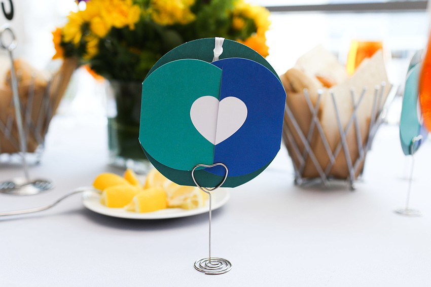 Guests placed their filled out donation cards on trees as 