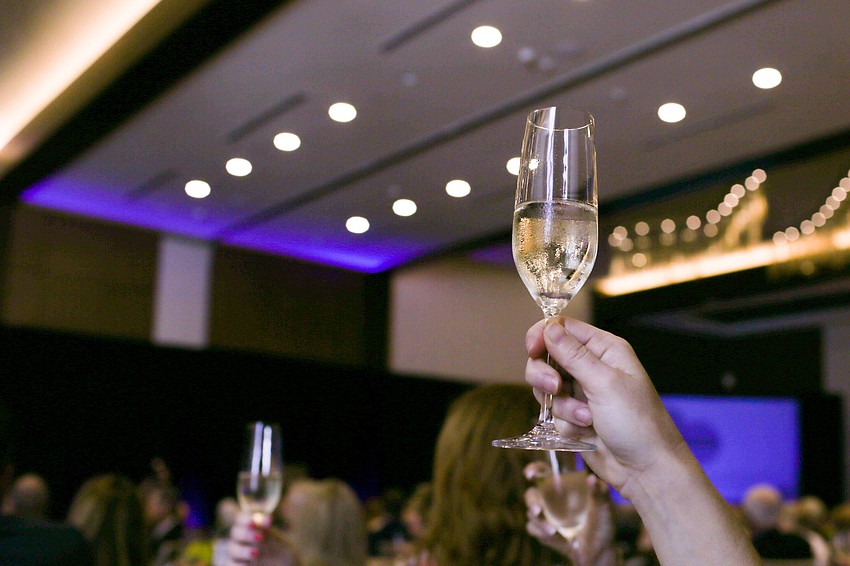 A Champagne toast was made in honor of Betty Schoenbaum.