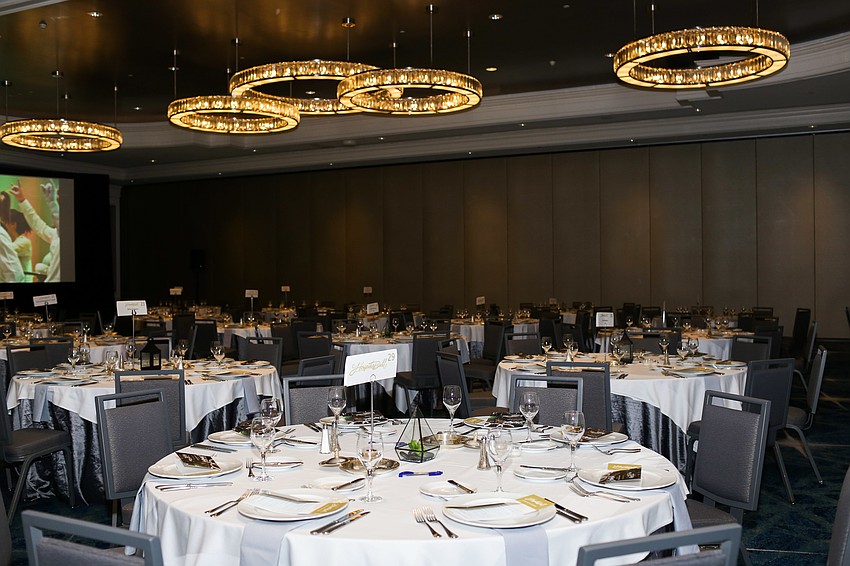 There were 39 tables set up in the ballroom.