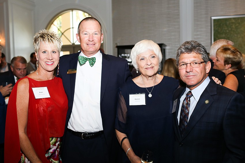 Pam and Eddie Beauchamp, Chancellor Karen Holbrook and Scott Hopes