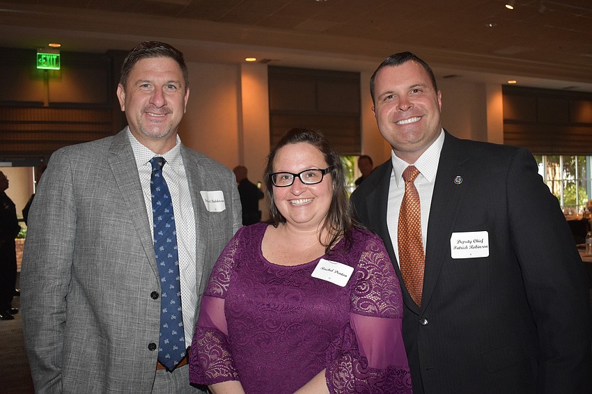 Forest Balderson, Rachel Denton and Deputy Chief of Police Patrick Robinson