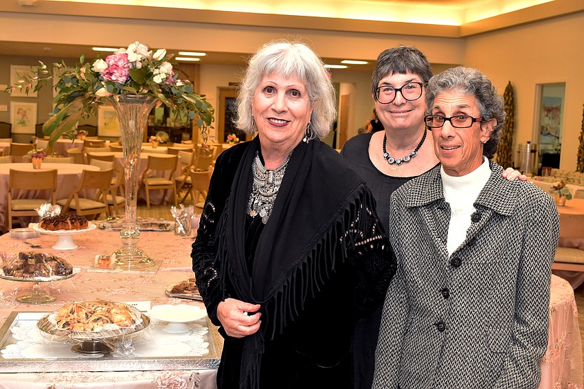 Sylvia Pastor, Debbie Cohen and Mac Spitzer helped prepare desserts and set up for the event.